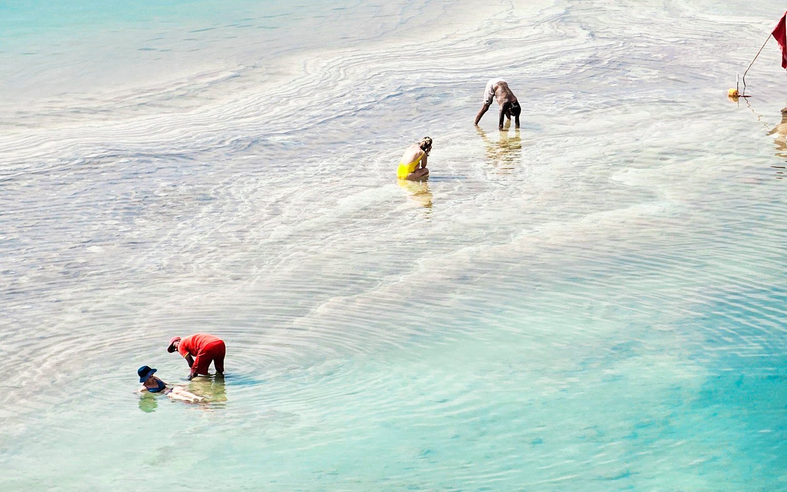swimming in the dead sea Jordan | Movenpick Resort & Spa Dead Sea